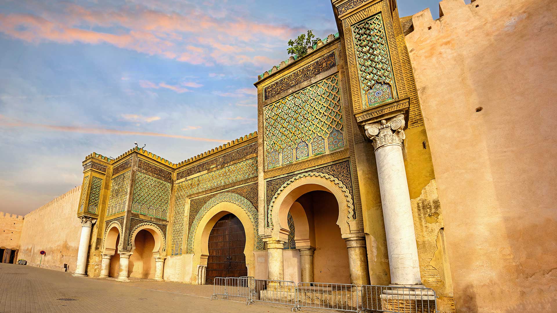 Old walls with gate Bab Mansour in medina of Meknes